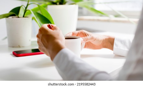 workplace background with  cup of coffee and tablet