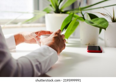 workplace background with  cup of coffee and tablet