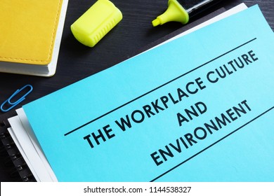 The Workplace Culture And Environment Report On A Desk.