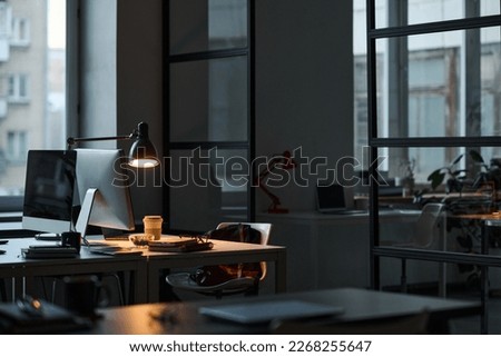 Workplace of developer in dark office