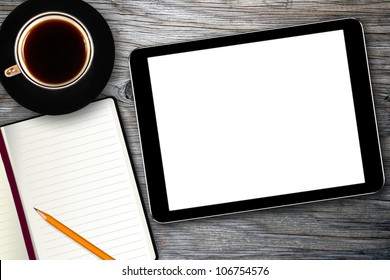 workplace with digital tablet, notebook and coffee cup - Powered by Shutterstock