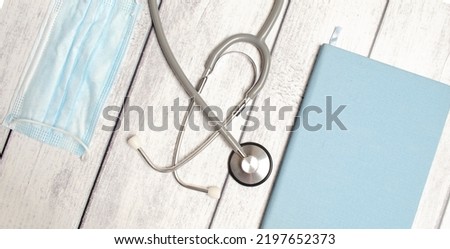 Workplace of a doctor. Stethoscope on medical table Healthcare and technology concept,
