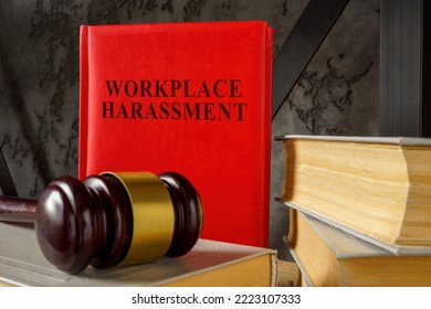 Workplace Harassment Law And Gavel On The Books.