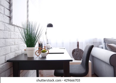 Workplace With Laptop On Table At Home