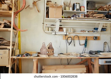 Workplace of modern craftsman in artisan workroom with all necessary equipment - Shutterstock ID 1006002838