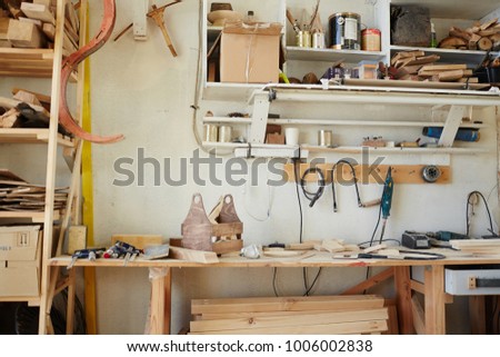 Workplace of modern craftsman in artisan workroom with all necessary equipment