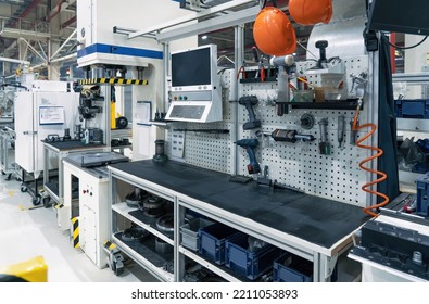 Workplace In Modern Industrial Factory, Interior And Equipment