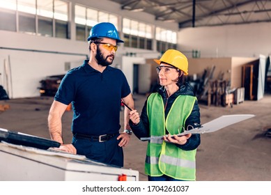 Workplace Safety Inspector Writing A Report At Industrial Factory