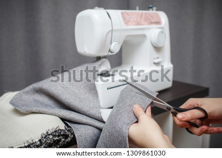 Similar – Image, Stock Photo Dressmaker cutting a cloth