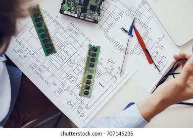 workplace technician-programmer top view, circuits, microchips, tools                               