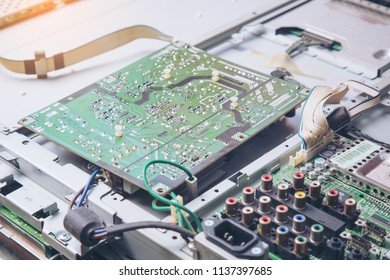 The Workplace Of A TV Repair Engineer Photography Of Main Board And Electronic Component Of Led Television Repairing .