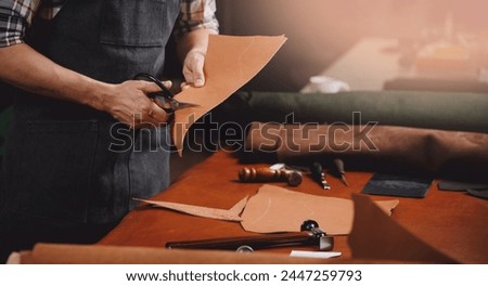 Workshop background tailor shoes maker from skin.Banner shoemaker industry business, Natural leather brown color with tools.