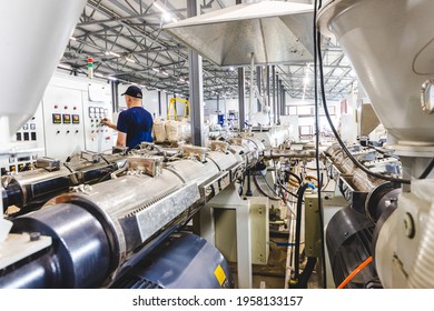 Workshop With Extruders For Producing Plastic Pipes. High Speed Extrusion Line Of Water Suppply And Gas Pipe. Manufacturing Facility.