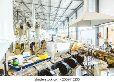 Workshop With Extruders For Producing Plastic Pipes. High Speed Extrusion Line Of Water Suppply And Gas Pipe. Manufacturing Facility.