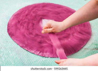 workshop of manufacturing of felt for beret in wet felting process - packing of wool fibers on back side of hat layout - Powered by Shutterstock