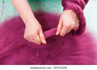 workshop of manufacturing of felt for beret in wet felting process - arranging of the second layer of wool fibers on hat layout - Powered by Shutterstock