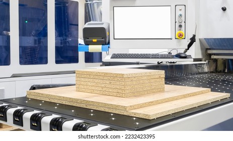 Workshop for the production of particle boards,  manufacture of chipboard, veneer, plywood, wood panels. Wood processing. Woodworking industry concept - Shutterstock ID 2232423395