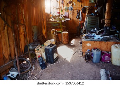 Workshop, Shed, Garage Or Storage Room With Tools For Repair, Chores, Spare Parts From Various Equipment.