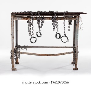 
Workshop table isolated on white background.
The workbench table is decorated with iron chains.
