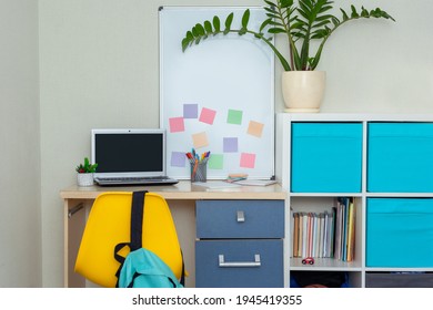 Workspace With Desk And Chair And Open Laptop Computer In Modern Room For Children. Working Table In Kid's Room.