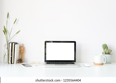 Workspace Desk And Laptop. Copy Space And Blank Screen. Business Image, Blank Screen Laptop And Supplies.