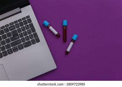 Workspace Of Doctor (laboratory Worker). Notebook, Test Tubes With Blood On Purple Background. Top View. Flat Lay