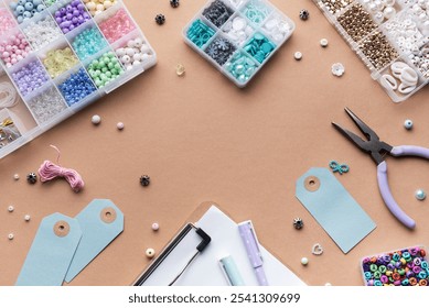 A workspace is filled with colorful beads, handmade tags, and crafting tools. Brightly colored supplies are spread out, inviting creativity and exploration in jewelry making. - Powered by Shutterstock