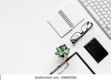 Workspace with keyboard and wallet office desk white background top view mock up - Shutterstock ID 636818182