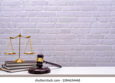 Workspace For Lawyer With Laptop Blank Screen And Wooden Gavel , Legal Law On Wood Table In Office. Workspace Background And Desk Work Mockup Concept.