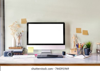 Workspace Mock Up Desktop Computer On Wood Table. Copy Space And Blank Screen For Products Or Graphics Montage.