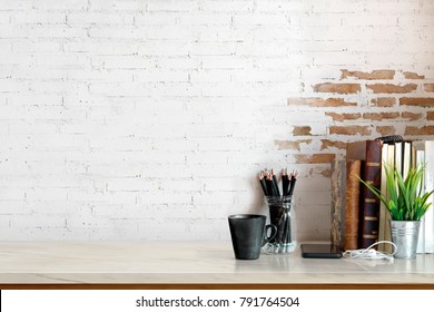 Workspace Mock up marble tabletop with vintage books, pencils and houseplant. copy space desk with copy space for products display montage. - Shutterstock ID 791764504