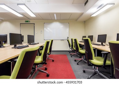 Workstations with computers for students in the exercise room - Powered by Shutterstock