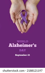 World Alzheimer's day. September 21 . International Epilepsy Day. Adult hands holding purple ribbon on purple background. World Lupus Day. Vertically photo - Shutterstock ID 2188121197