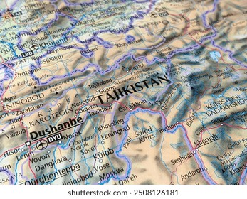 world atlas map of Tajikistan, shows major cities, highlighting geographic features, political boundaries, and physical landmarks for global orientation and exploration