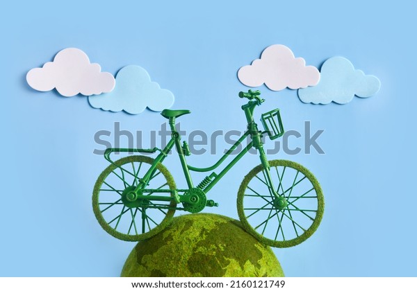 World Bicycle Day. Green bicycle and world.\
Environment preserve.