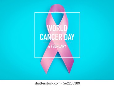 World Cancer Day : Breast Cancer Awareness Ribbon On Blue Background