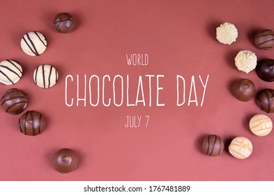 World Chocolate Day stock images. Chocolate pralines on a brown background top view stock images. Different types of chocolate candies images. Chocolate Day Poster, July 7. Important day