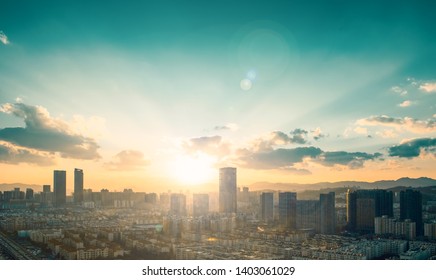 World Cities Day concept: big city at sunset background - Shutterstock ID 1403061029