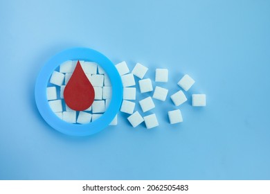 World Diabetes Day Awareness. Blue Circle With Blood Drop And Sugar Cubes.