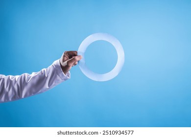 World diabetes day awareness concept. Doctor hands holding blue circle of universal symbol for diabetes. - Powered by Shutterstock