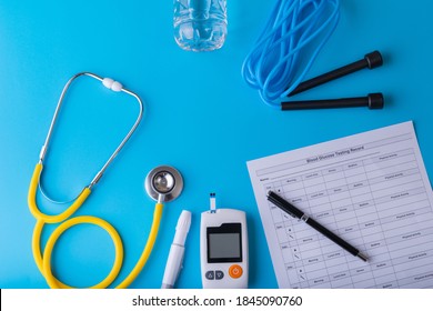 World Diabetes Day Concept. Diabetes Monitor With Document Checking, Diabetic Measurement. Yellow Stethoscope With Exercise Equipment.