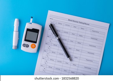 World Diabetes Day. National American Diabetic Awareness. Free Glucose Monitors On Blue Background. Healthcare And Medical Concept