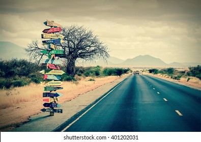 World directions signpost with distance to many different countries - Shutterstock ID 401202031