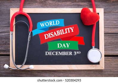 World Disability Day, December 3rd On Chalkboard, Stethoscope And Red Heart, Health Concepts. 