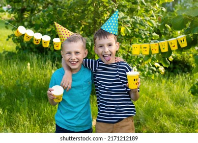 World Emoji Day and Smile Day, children in caps celebrate birthday, happy holidays, smiles on their faces