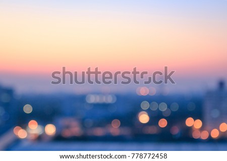 World environment day concept: Bokeh light and blur modern city skyline sunrise background. Bangkok, Thailand, Asia