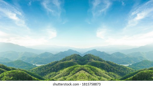 World environment day concept: Green mountains and beautiful blue sky clouds - Shutterstock ID 1815758873