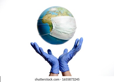 World Epidemic Danger. World need protect the earth globe with a face mask and hands, isolated on a white background. Human Epidemic Danger. Earth globe with Hungarian text.
					