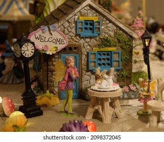 World Of Fairytales Where Animals, And Figurines Come Together In A Magical Setting