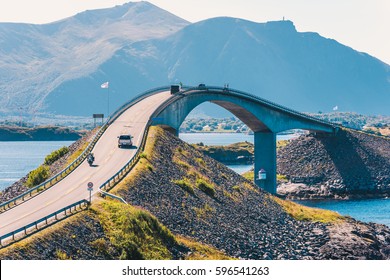 World famous Atlantic road bridge (Atlanterhavsvegen) with an amazing view over the norwegian mountains. Atlantic road runs through an archipelago in Eide and Averøy in Møre og Romsdal, Norway.